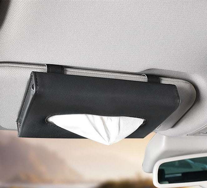 Black car visor tissue holder shown installed on a vehicle sun visor