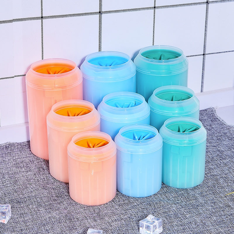 Portable dog paw cleaner cups in orange blue and green shown in three sizes