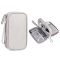 Light-colored tech organizer pouch shown closed and open.