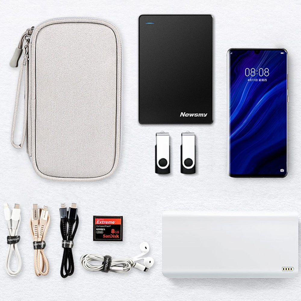 Tech organizer pouch alongside electronics and accessories used as storage examples.