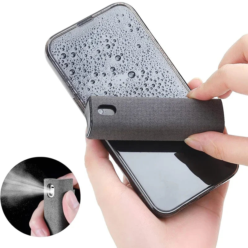 Grey microfiber screen cleaner wiping a phone screen with a spray demonstration inset
