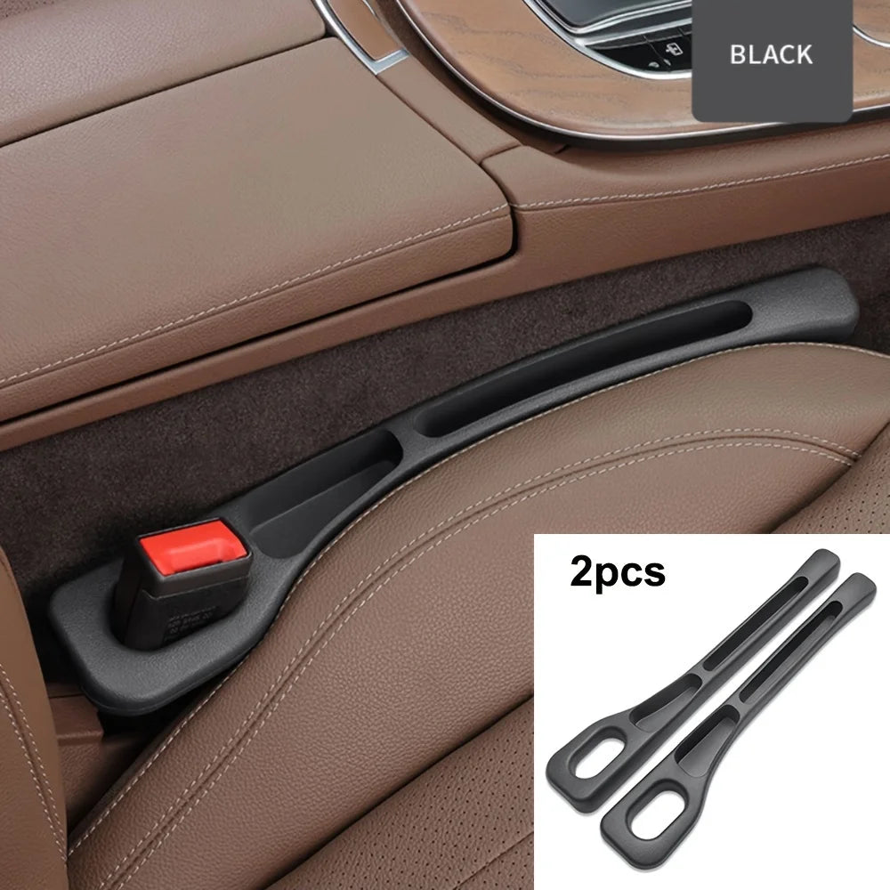 Black car seat gap filler installed between front seat and center console in tan leather interior, with color swatch labeled BLACK and 2-piece product inset showing both slim organizer strips