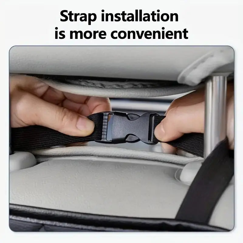 Close-up of hands fastening the quick-release buckle strap of a car seat back organizer onto a headrest post