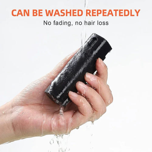Microfiber screen cleaner being rinsed under running water