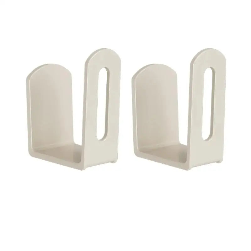 Two white router storage brackets shown on a white background.
